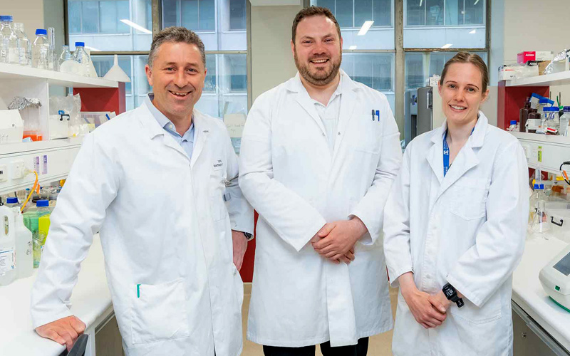 Professor Matthew Watt, Dr Garron Dodd and Dr Paula Miotto in a laboratory